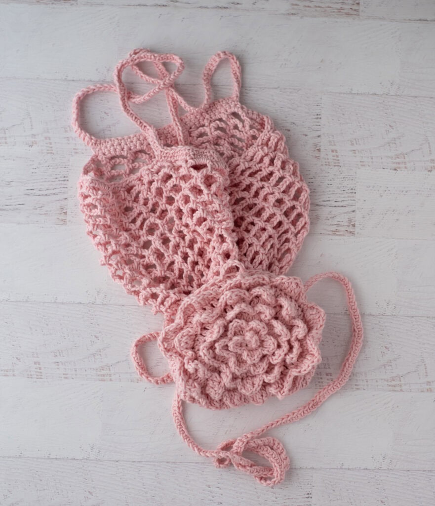 Pink crochet market bag unfolded