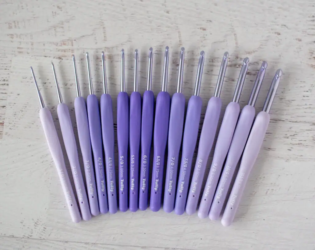 set of 15 crochet hooks in graduating shades of purple