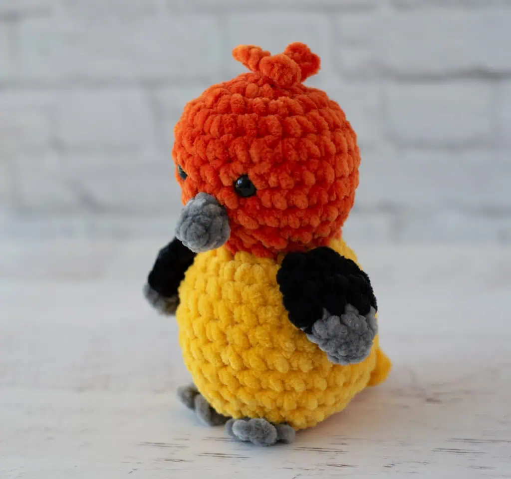 Crochet Western Tanager Bird from angle close up